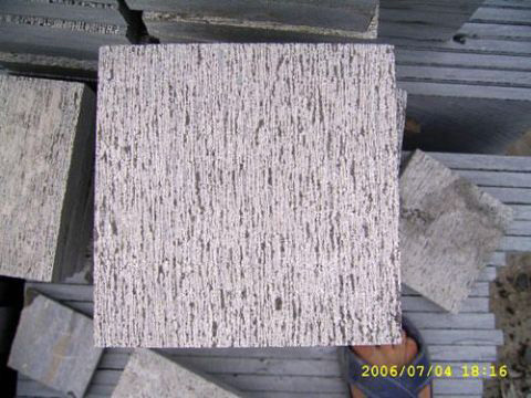 手工剁斧地铺石